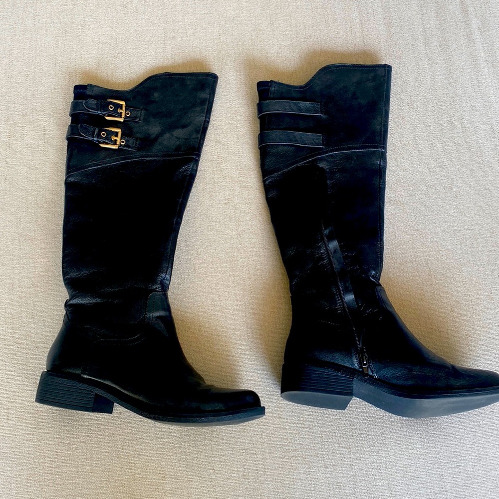 Knee high leather low heeled boots